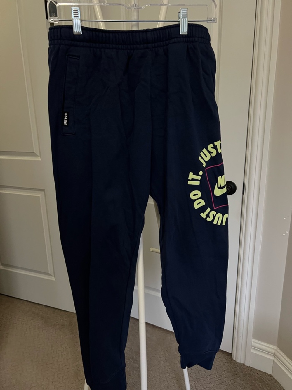 Nike Men's Navy Sweatpants with Neon Yellow 'Just Do It' Logo